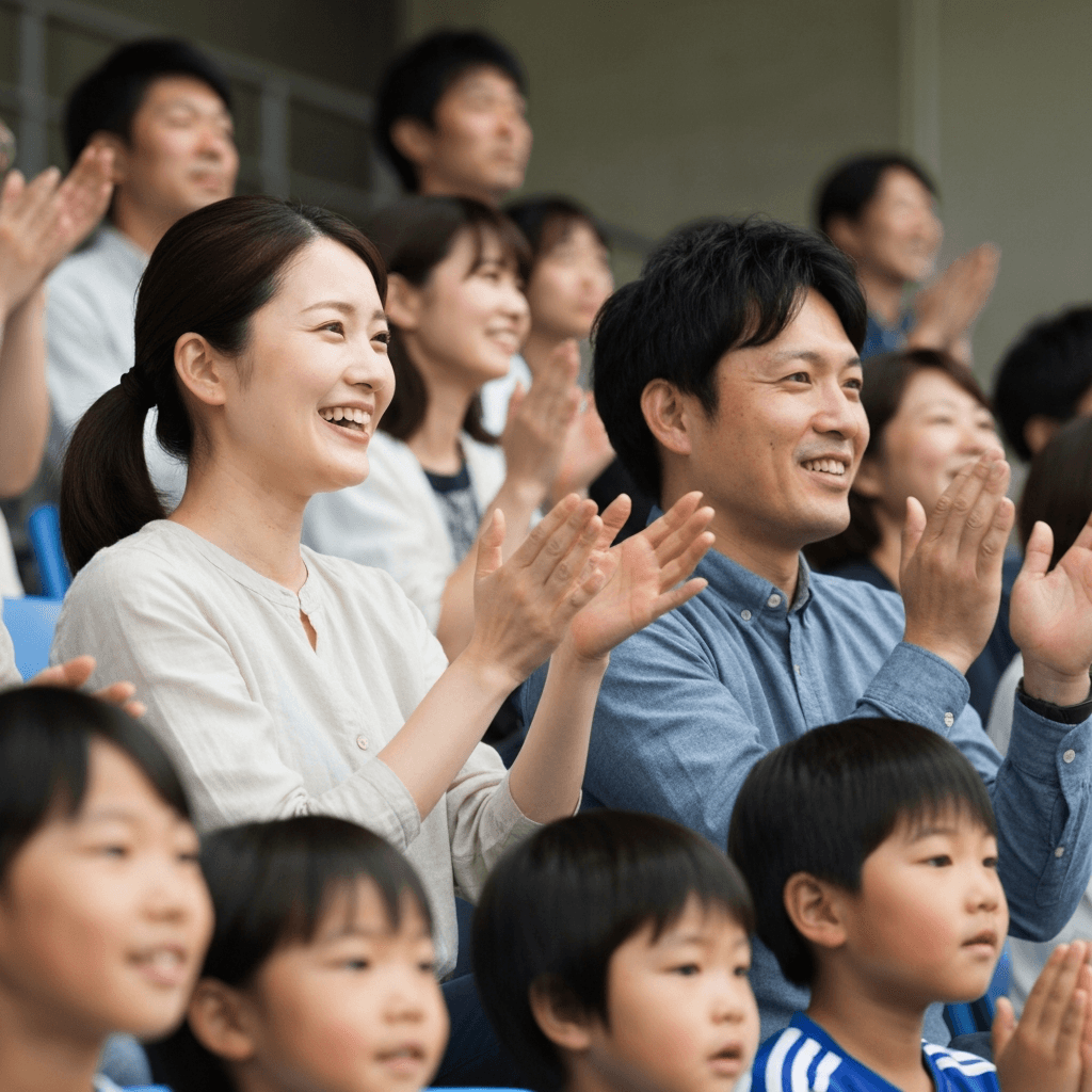 子どもの試合を温かく見守る保護者たち